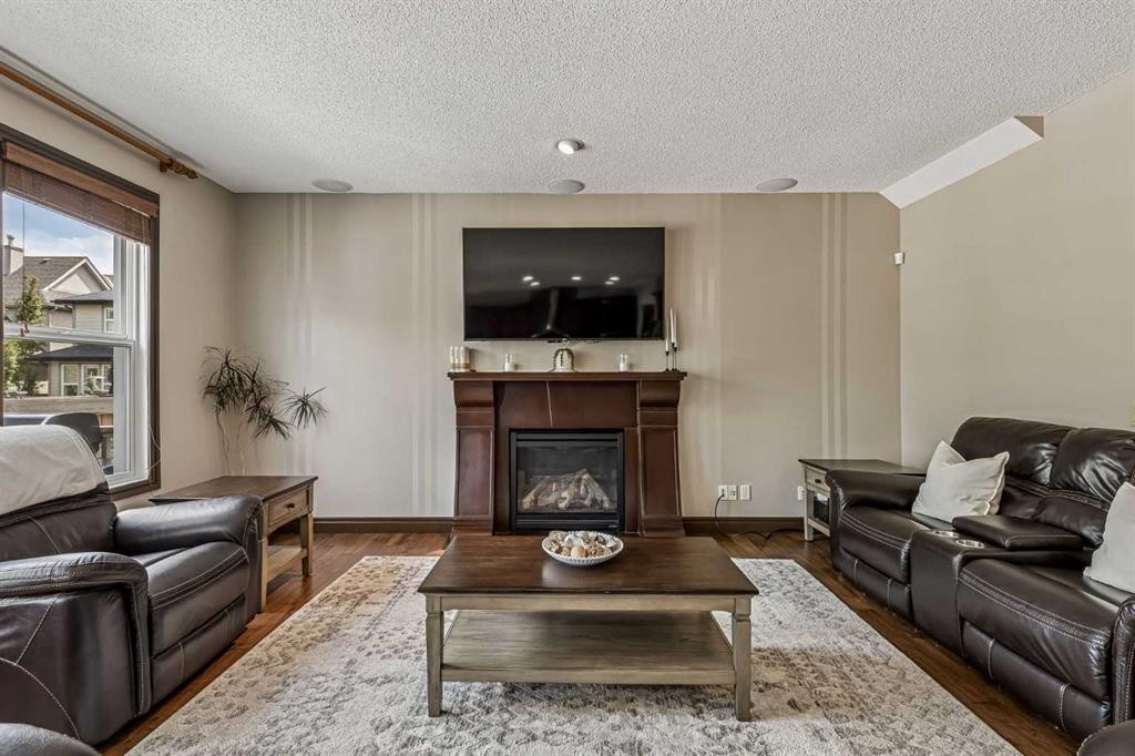 12 Mahogany Heath Se, Calgary, AB - Indoor Photo Showing Living Room With Fireplace