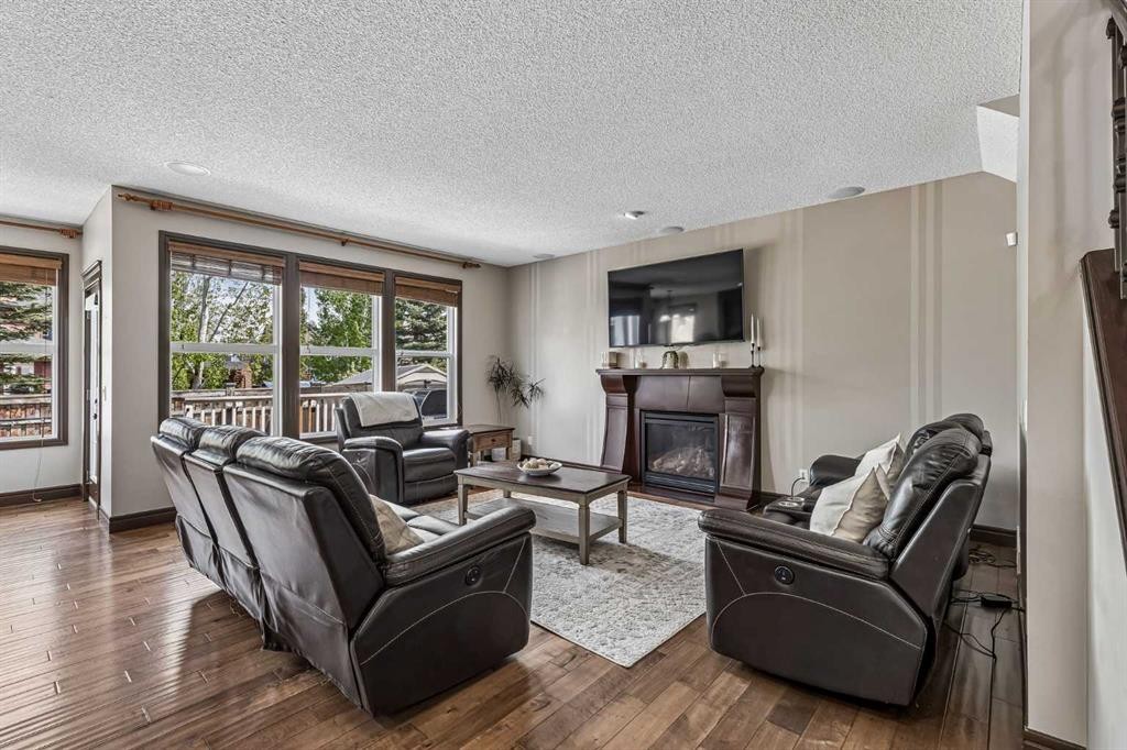 12 Mahogany Heath Se, Calgary, AB - Indoor Photo Showing Living Room With Fireplace