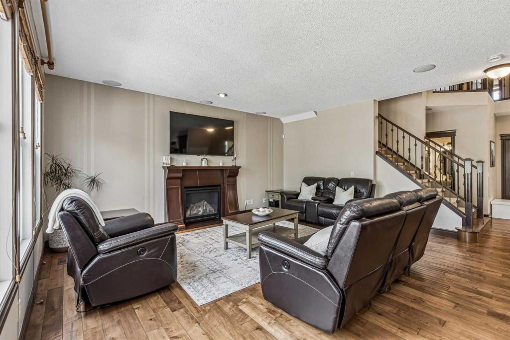 12 Mahogany Heath Se, Calgary, AB - Indoor Photo Showing Living Room With Fireplace