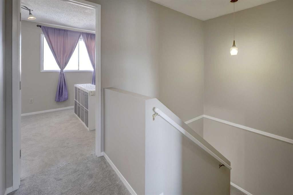 107 Macewan Park Way Nw, Calgary, AB - Indoor Photo Showing Other Room
