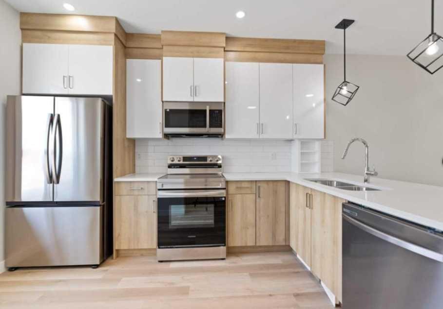 314-52 Red Sky Villas Ne, Calgary, AB - Indoor Photo Showing Kitchen With Stainless Steel Kitchen With Double Sink With Upgraded Kitchen
