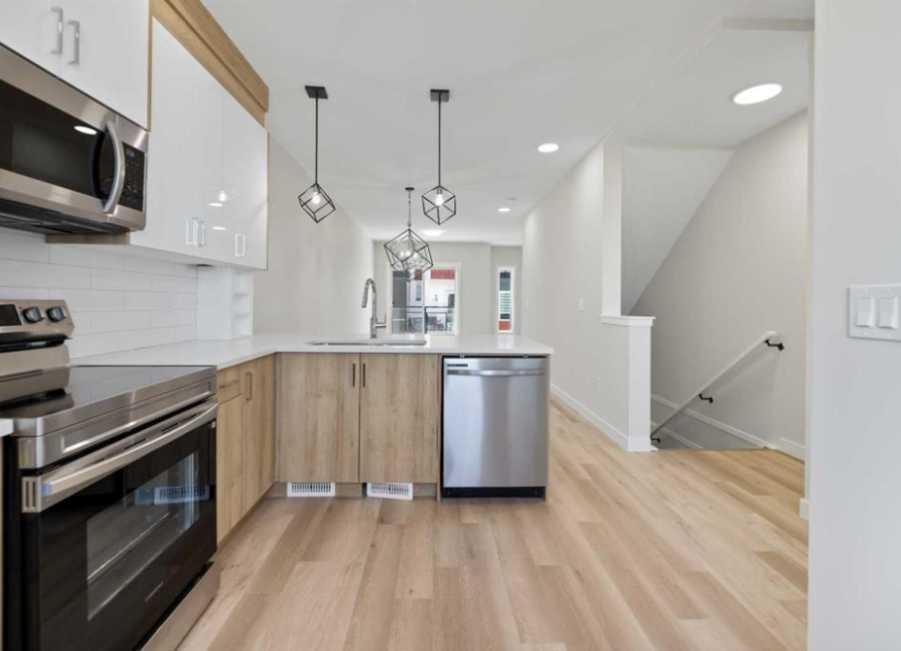314-52 Red Sky Villas Ne, Calgary, AB - Indoor Photo Showing Kitchen With Stainless Steel Kitchen With Upgraded Kitchen