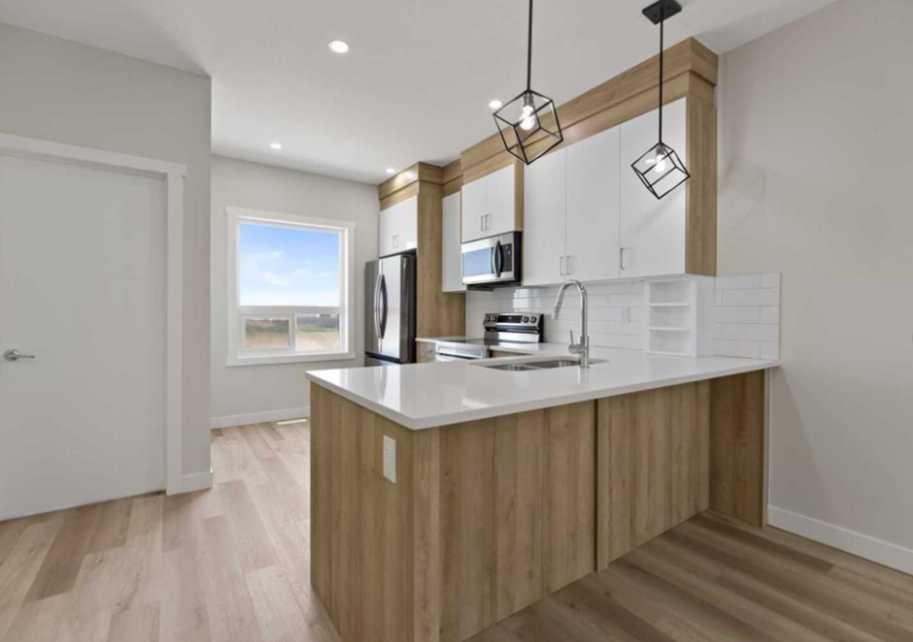314-52 Red Sky Villas Ne, Calgary, AB - Indoor Photo Showing Kitchen With Upgraded Kitchen