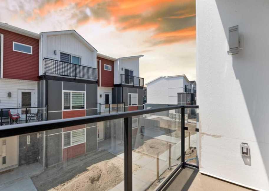 314-52 Red Sky Villas Ne, Calgary, AB - Outdoor With Balcony With Exterior