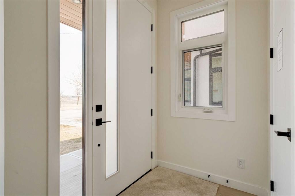 39B Moncton Road Ne, Calgary, AB - Indoor Photo Showing Other Room