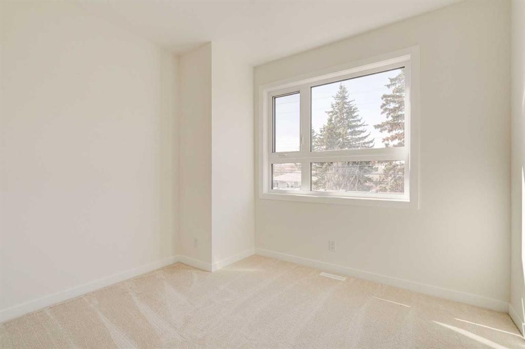 39B Moncton Road Ne, Calgary, AB - Indoor Photo Showing Other Room