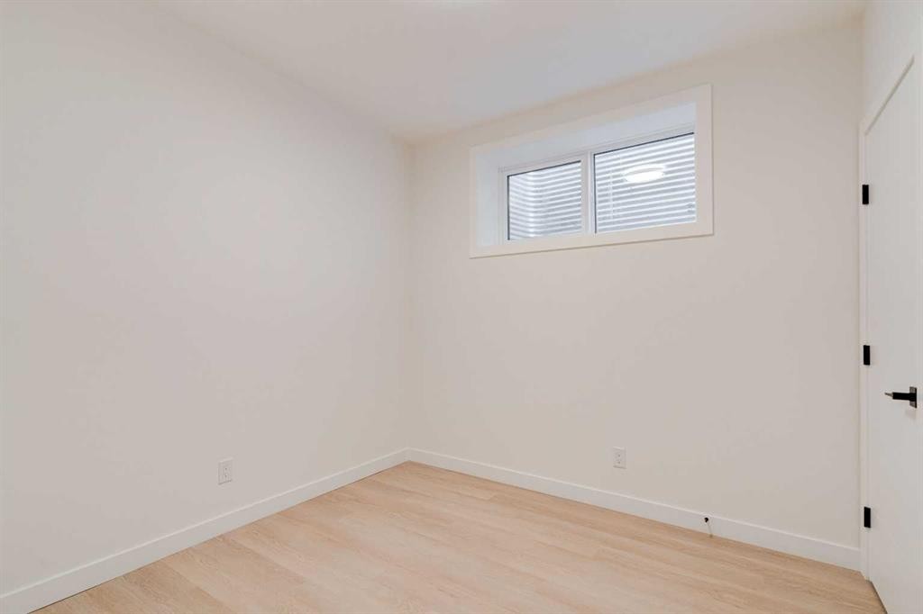 39B Moncton Road Ne, Calgary, AB - Indoor Photo Showing Other Room