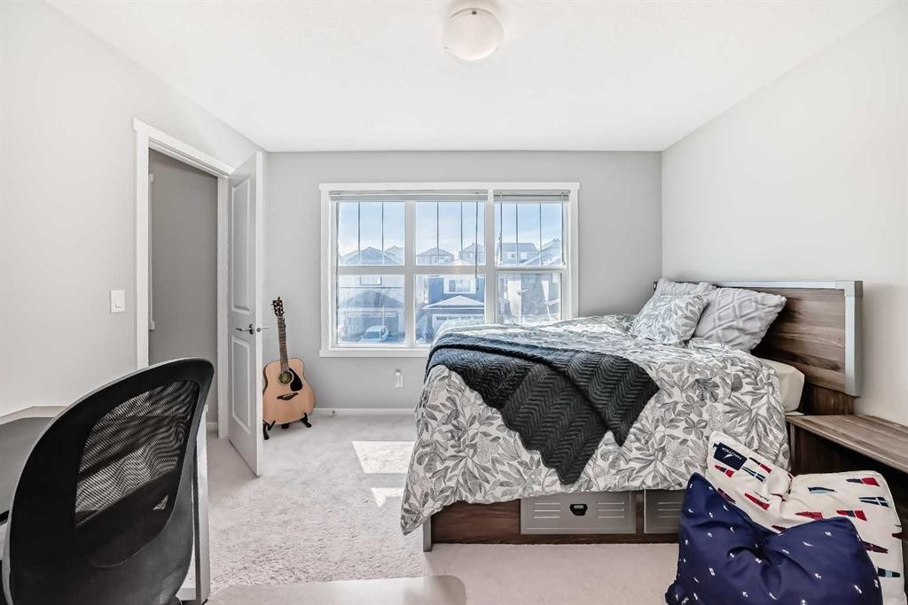 64 Nolancrest Manor Nw, Calgary, AB - Indoor Photo Showing Bedroom
