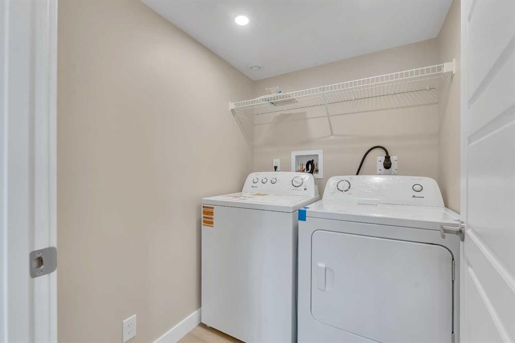221 Madeira Crescent Ne, Calgary, AB - Indoor Photo Showing Laundry Room