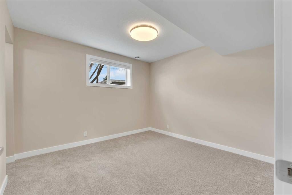 221 Madeira Crescent Ne, Calgary, AB - Indoor Photo Showing Other Room