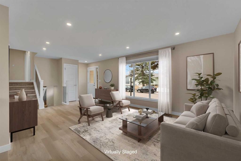 221 Madeira Crescent Ne, Calgary, AB - Indoor Photo Showing Living Room