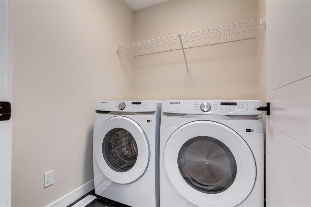 353 Cobblestone Gate, Airdrie, AB - Indoor Photo Showing Laundry Room