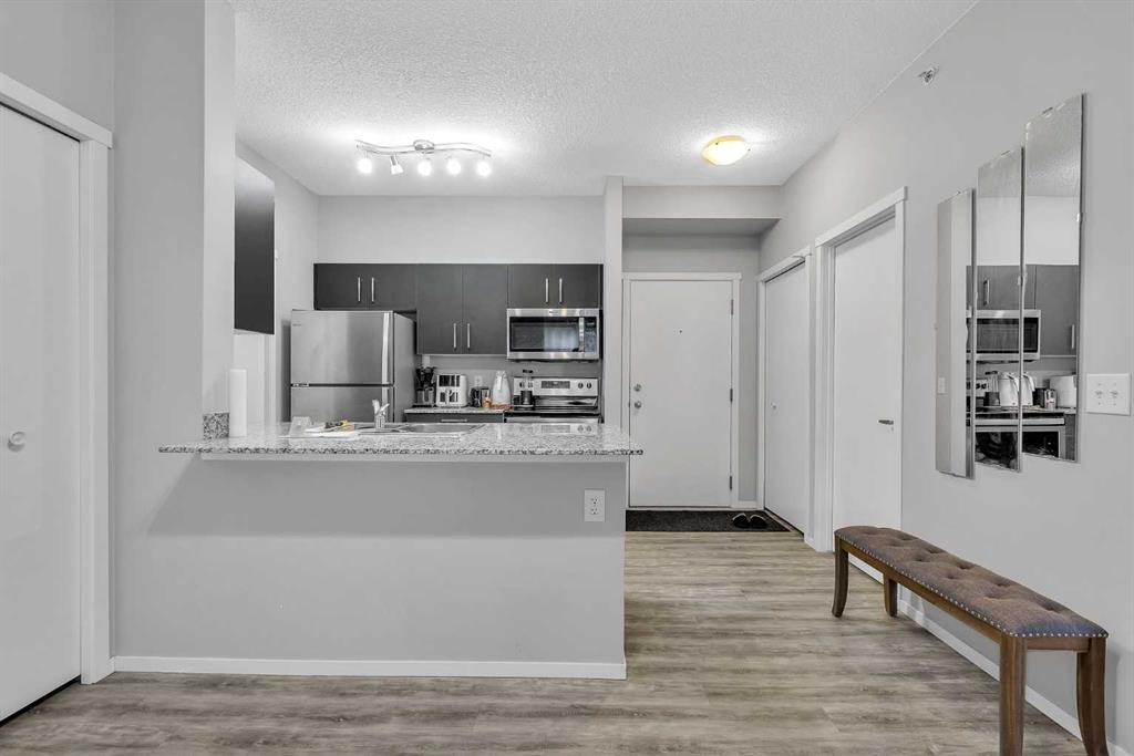 1613-4641 128 Avenue Ne, Calgary, AB - Indoor Photo Showing Kitchen With Upgraded Kitchen