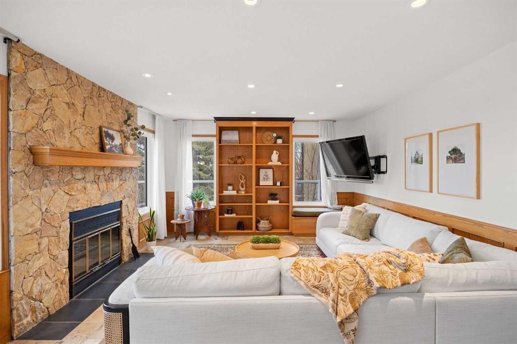 47 Edgeridge Court Nw, Calgary, AB - Indoor Photo Showing Living Room With Fireplace