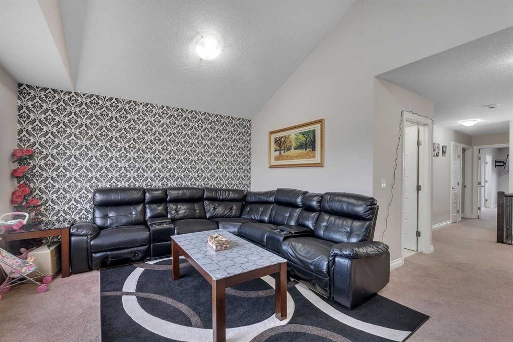 28 Saddlelake Common Ne, Calgary, AB - Indoor Photo Showing Living Room