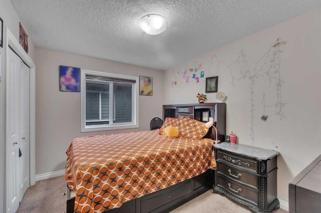 28 Saddlelake Common Ne, Calgary, AB - Indoor Photo Showing Bedroom