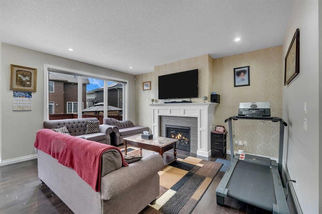 28 Saddlelake Common Ne, Calgary, AB - Indoor With Fireplace