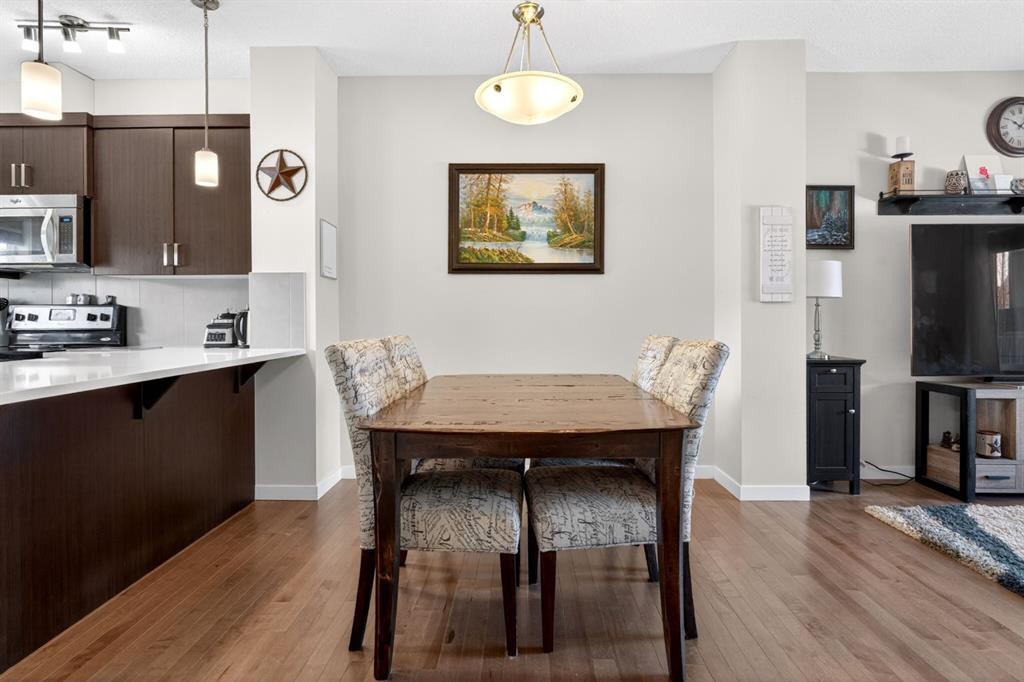 23 Belgian Link, Cochrane, AB - Indoor Photo Showing Dining Room