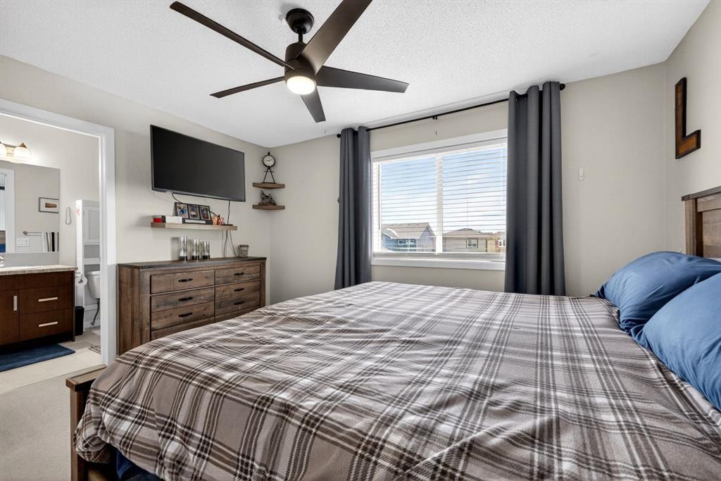 23 Belgian Link, Cochrane, AB - Indoor Photo Showing Bedroom
