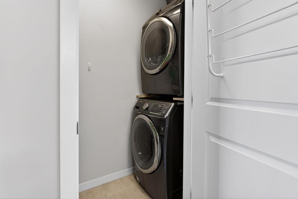 23 Belgian Link, Cochrane, AB - Indoor Photo Showing Laundry Room