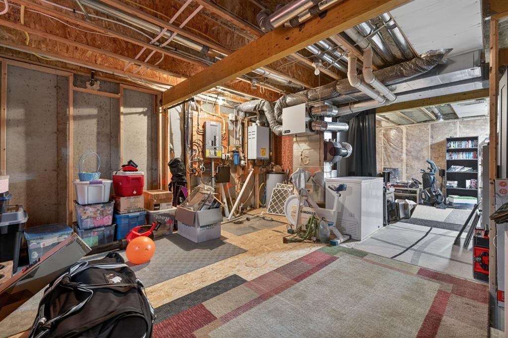 23 Belgian Link, Cochrane, AB - Indoor Photo Showing Basement