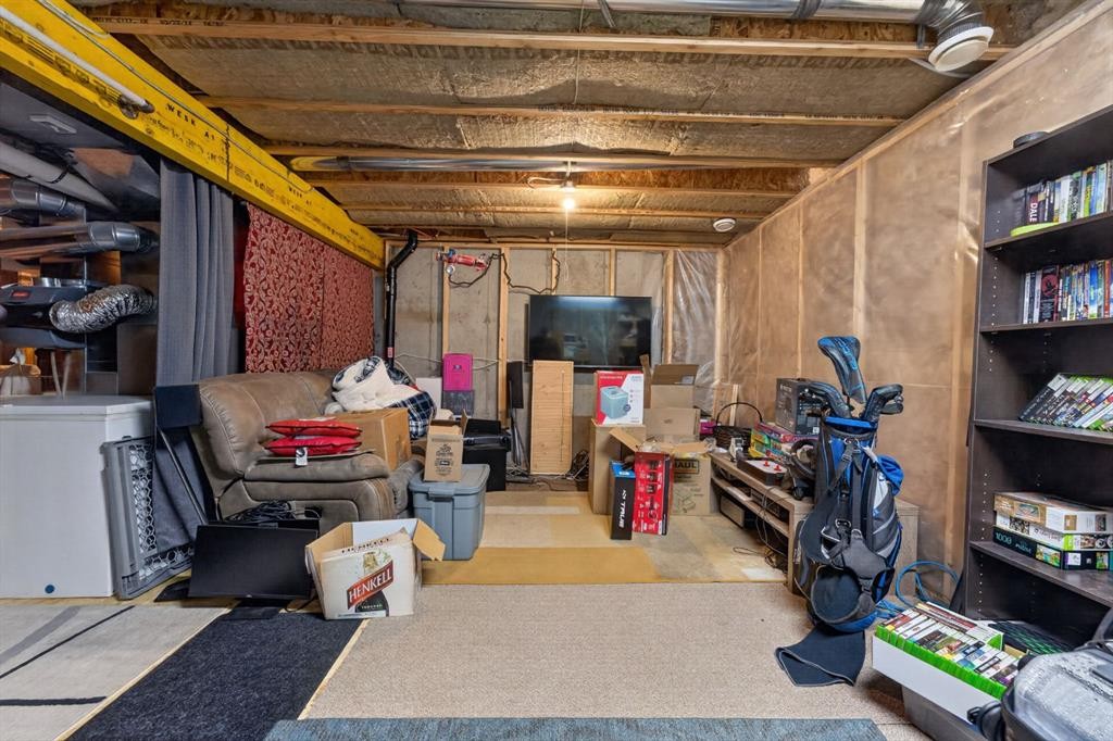23 Belgian Link, Cochrane, AB - Indoor Photo Showing Basement