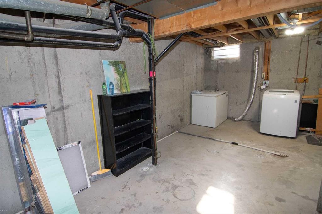 6-100 Pennsylvania Road Se, Calgary, AB - Indoor Photo Showing Basement