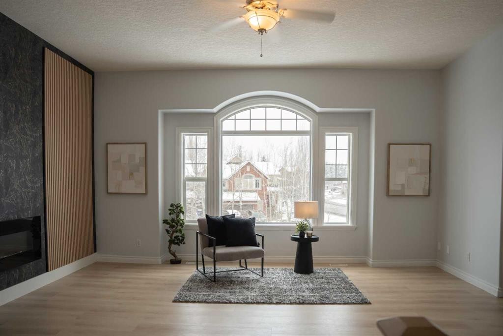 3 Strathridge Bay Sw, Calgary, AB - Indoor With Fireplace
