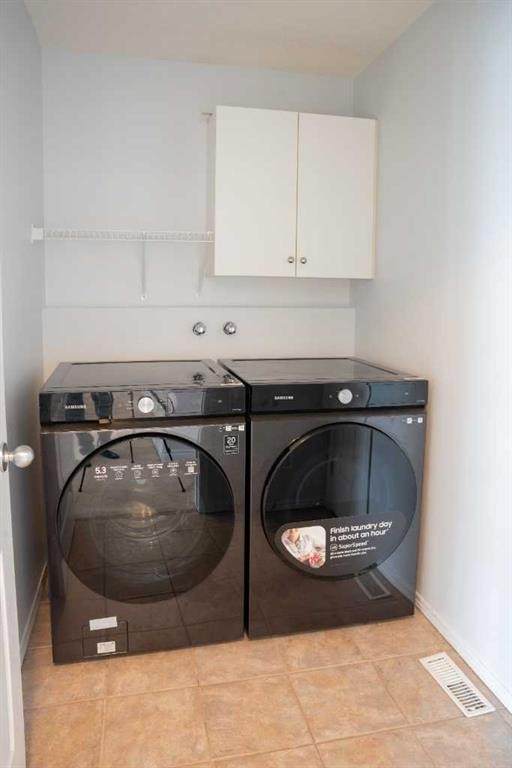 3 Strathridge Bay Sw, Calgary, AB - Indoor Photo Showing Laundry Room