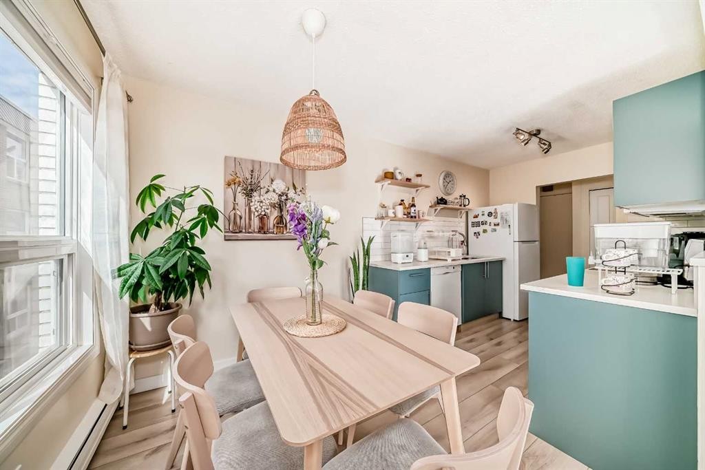 202-520 Cedar Crescent Sw, Calgary, AB - Indoor Photo Showing Dining Room