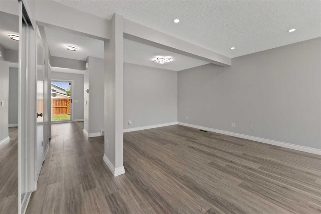42 River Rock Road Se, Calgary, AB - Indoor Photo Showing Other Room