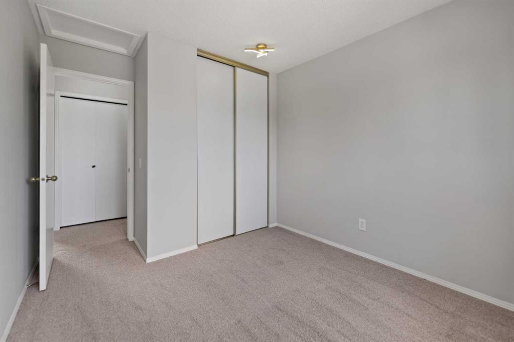 42 River Rock Road Se, Calgary, AB - Indoor Photo Showing Other Room