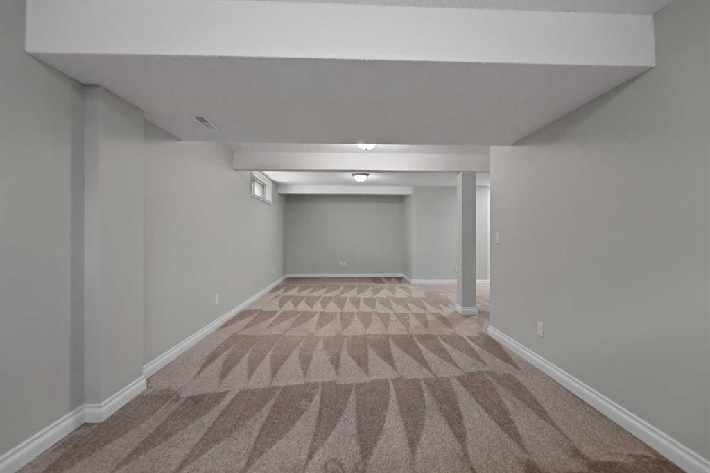 42 River Rock Road Se, Calgary, AB - Indoor Photo Showing Other Room