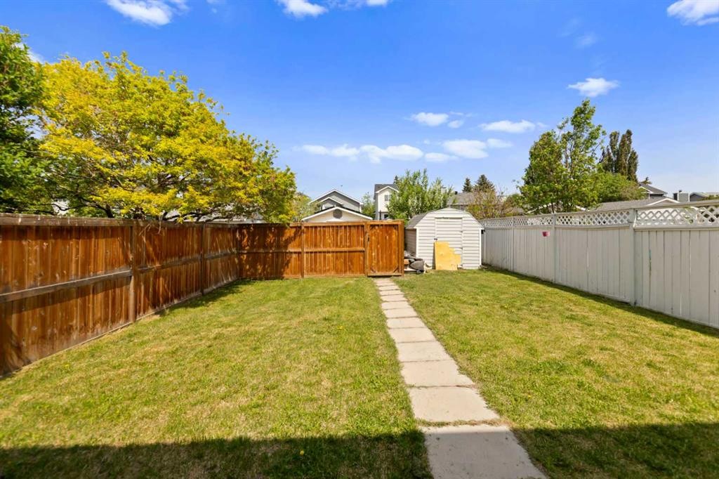 42 River Rock Road Se, Calgary, AB - Outdoor With Backyard