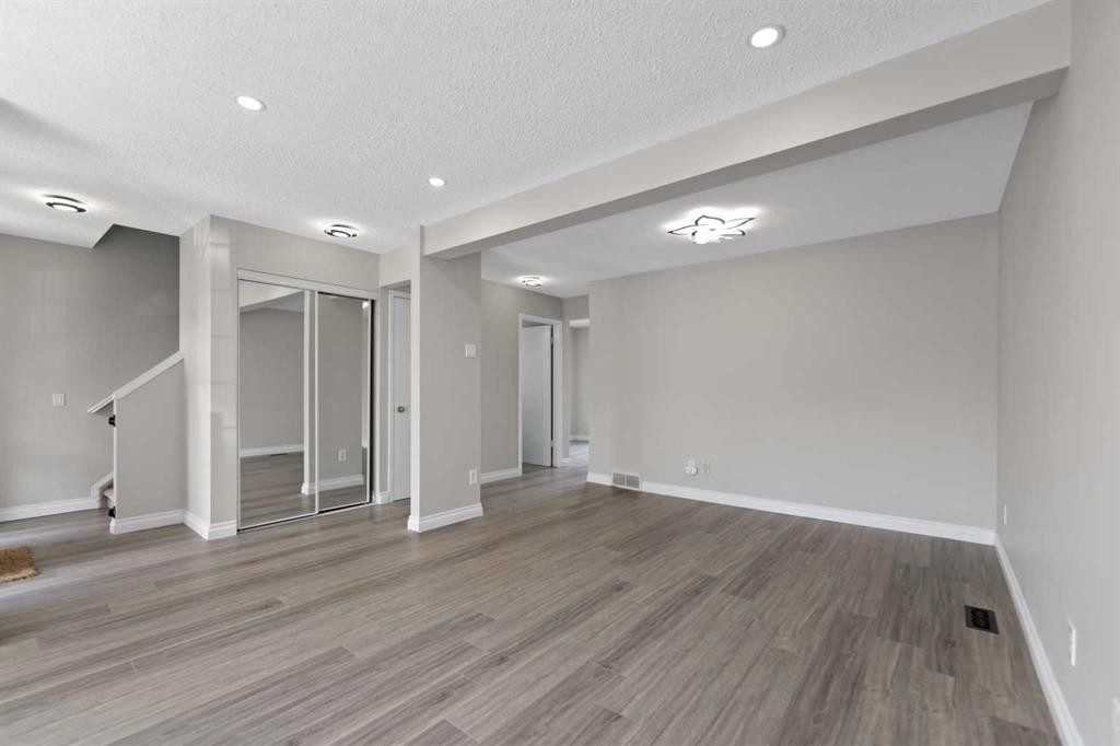 42 River Rock Road Se, Calgary, AB - Indoor Photo Showing Other Room