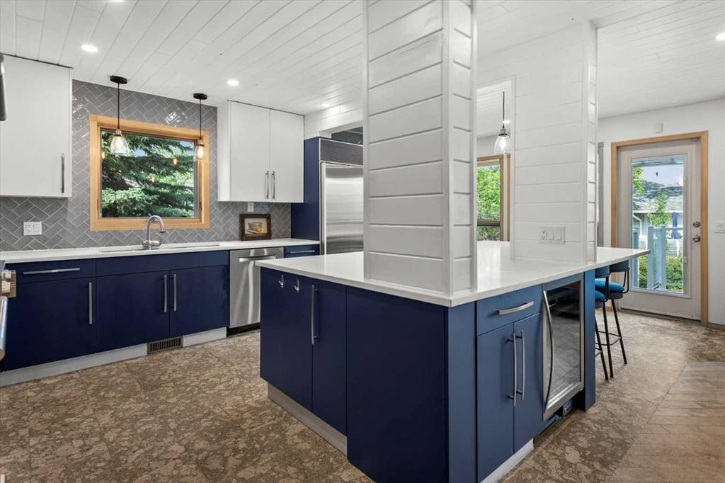 75 Hawkside Close Nw, Calgary, AB - Indoor Photo Showing Kitchen With Upgraded Kitchen