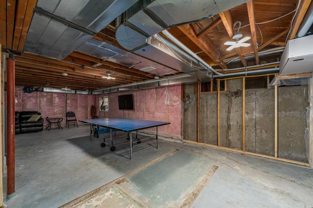 2328 58 Avenue Sw, Calgary, AB - Indoor Photo Showing Basement