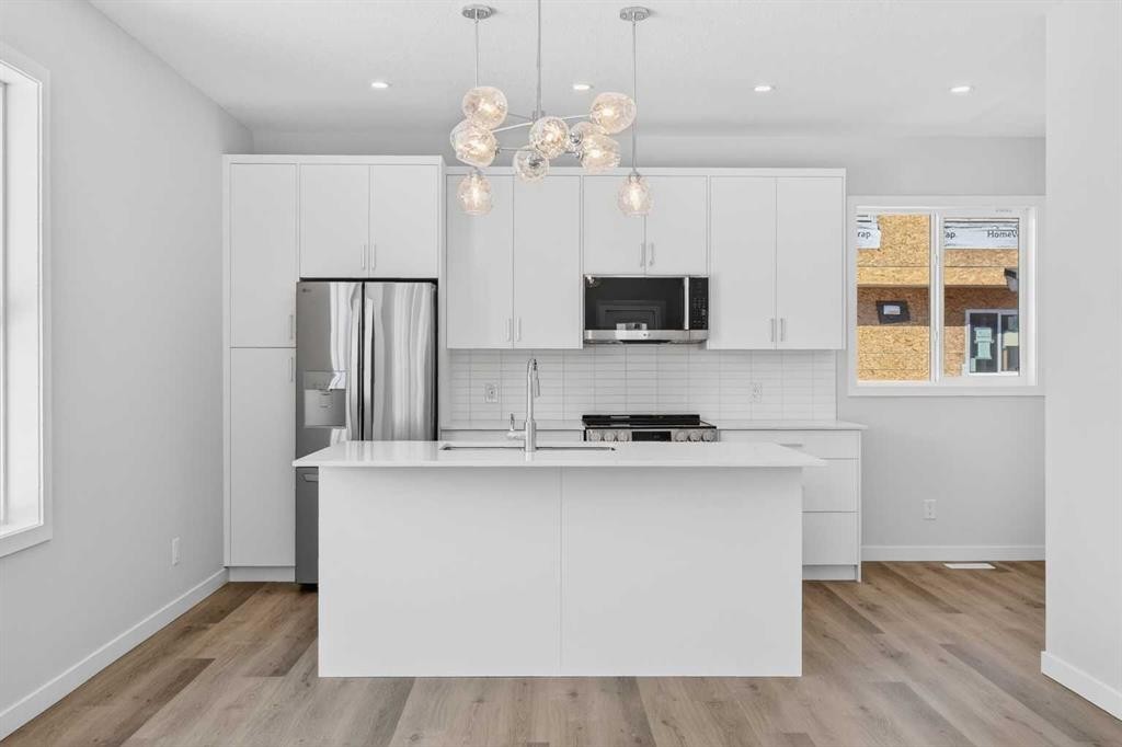 828-132 Red Embers Link Ne, Calgary, AB - Indoor Photo Showing Kitchen With Upgraded Kitchen
