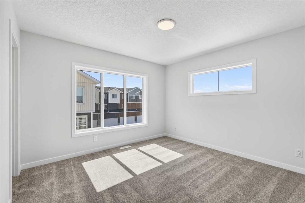 828-132 Red Embers Link Ne, Calgary, AB - Indoor Photo Showing Other Room