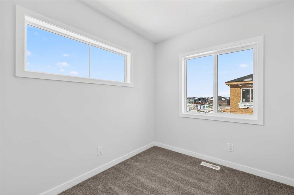828-132 Red Embers Link Ne, Calgary, AB - Indoor Photo Showing Other Room
