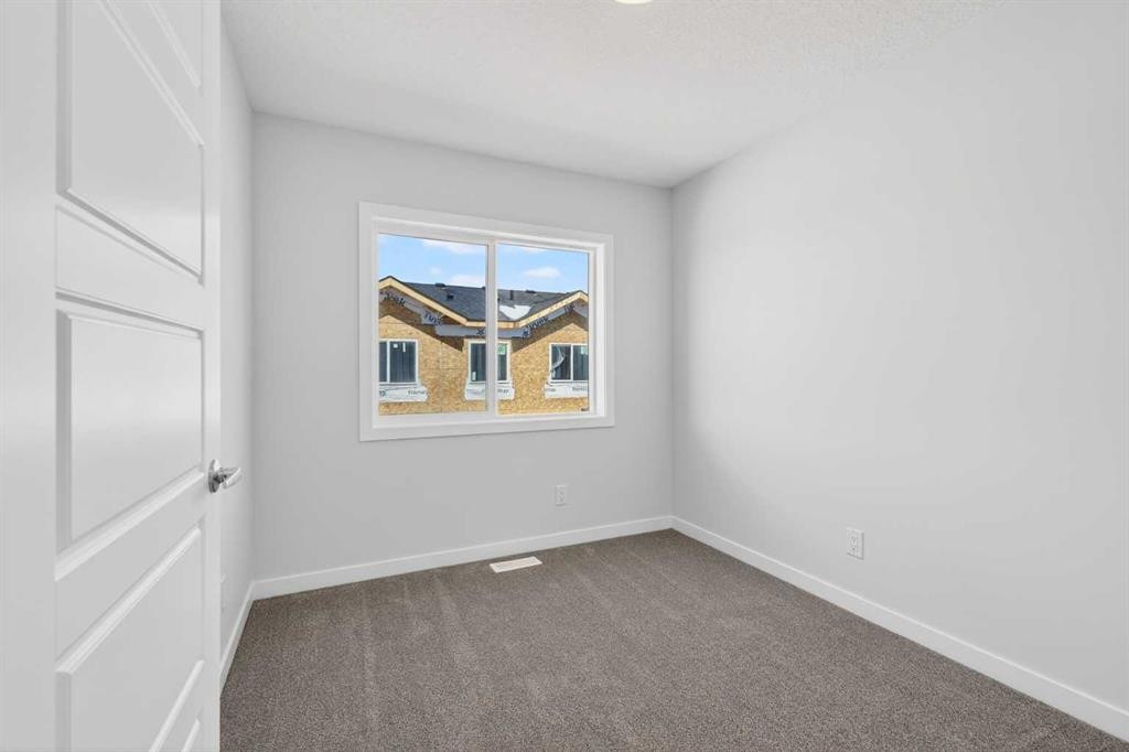 828-132 Red Embers Link Ne, Calgary, AB - Indoor Photo Showing Other Room