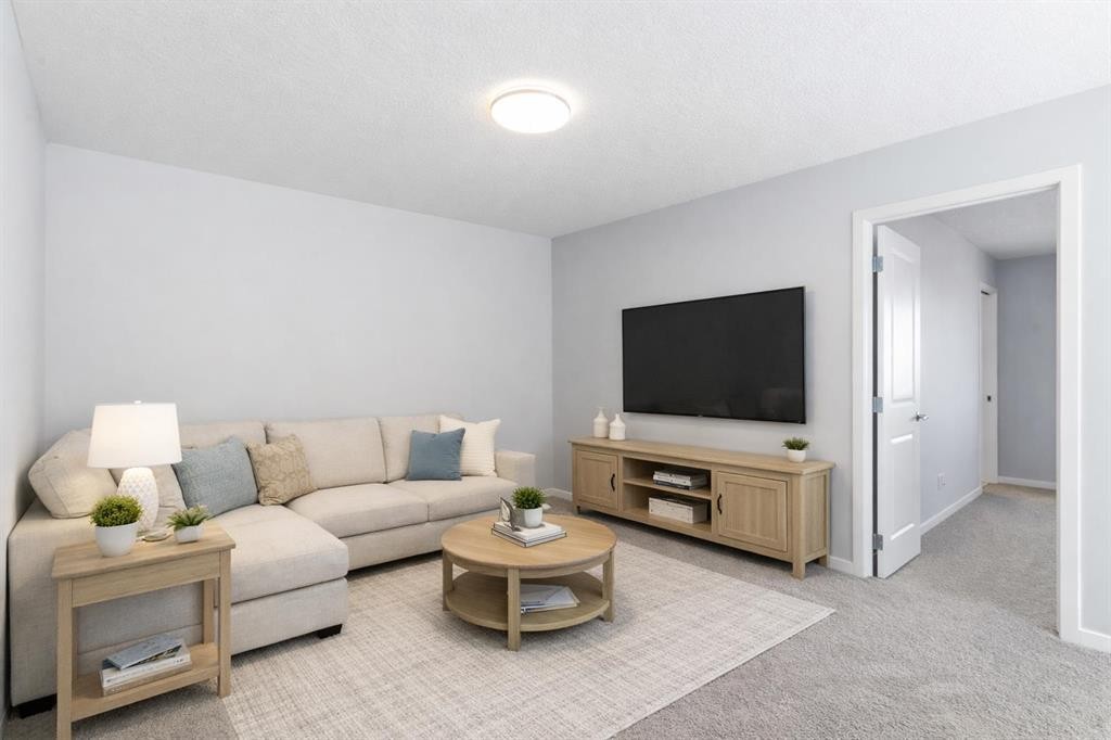 623 Buffaloberry Manor Se, Calgary, AB - Indoor Photo Showing Living Room