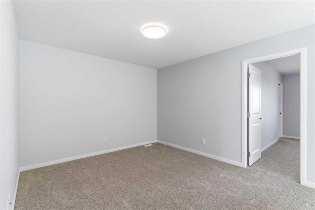 623 Buffaloberry Manor Se, Calgary, AB - Indoor Photo Showing Other Room