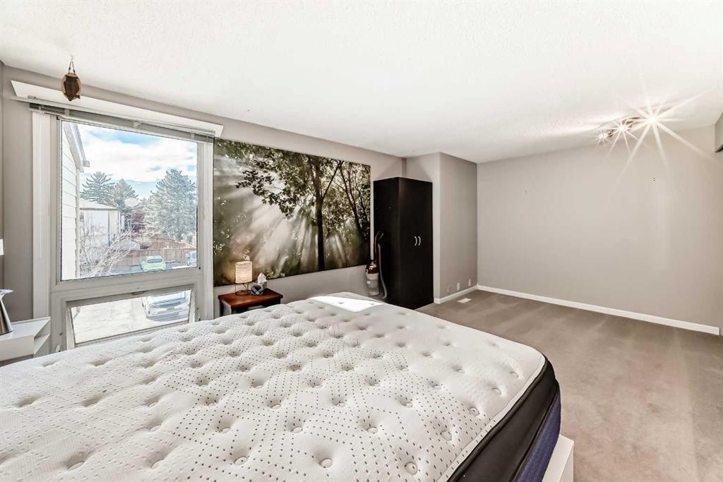 13-1845 Lysander Crescent Se, Calgary, AB - Indoor Photo Showing Bedroom