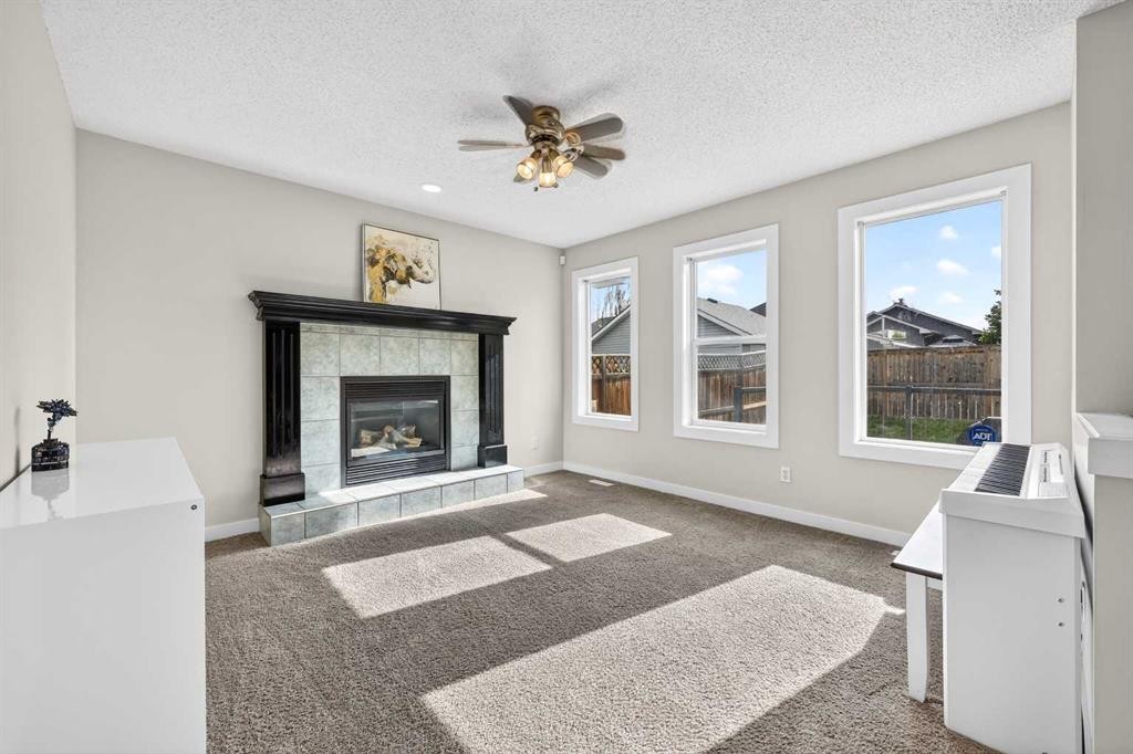988 Prestwick Circle Se, Calgary, AB - Indoor Photo Showing Living Room With Fireplace