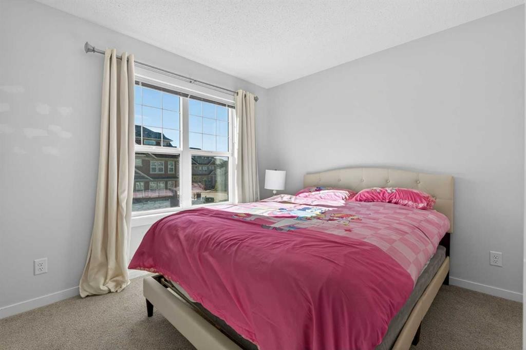 340 Cranbrook Square Se, Calgary, AB - Indoor Photo Showing Bedroom