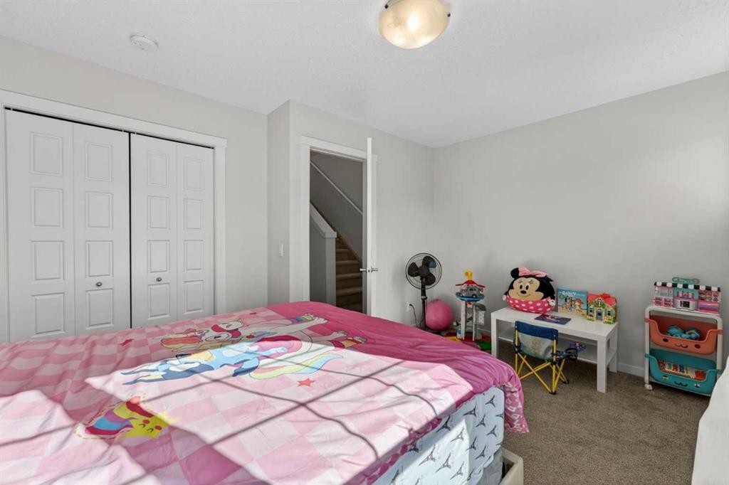 340 Cranbrook Square Se, Calgary, AB - Indoor Photo Showing Bedroom