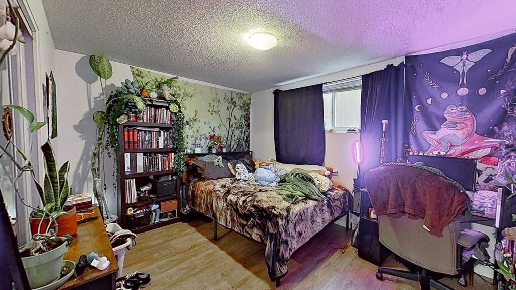 11723 Canfield Road Sw, Calgary, AB - Indoor Photo Showing Bedroom
