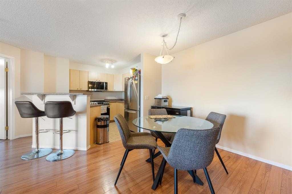 1406-12 Cimarron Common, Okotoks, AB - Indoor Photo Showing Dining Room