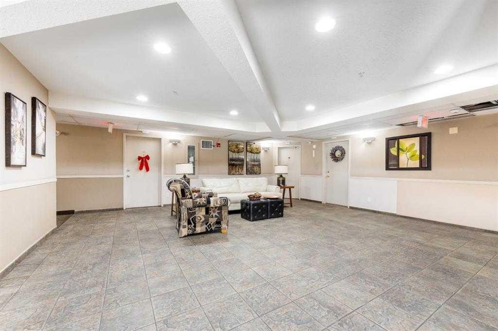 1406-12 Cimarron Common, Okotoks, AB - Indoor Photo Showing Other Room